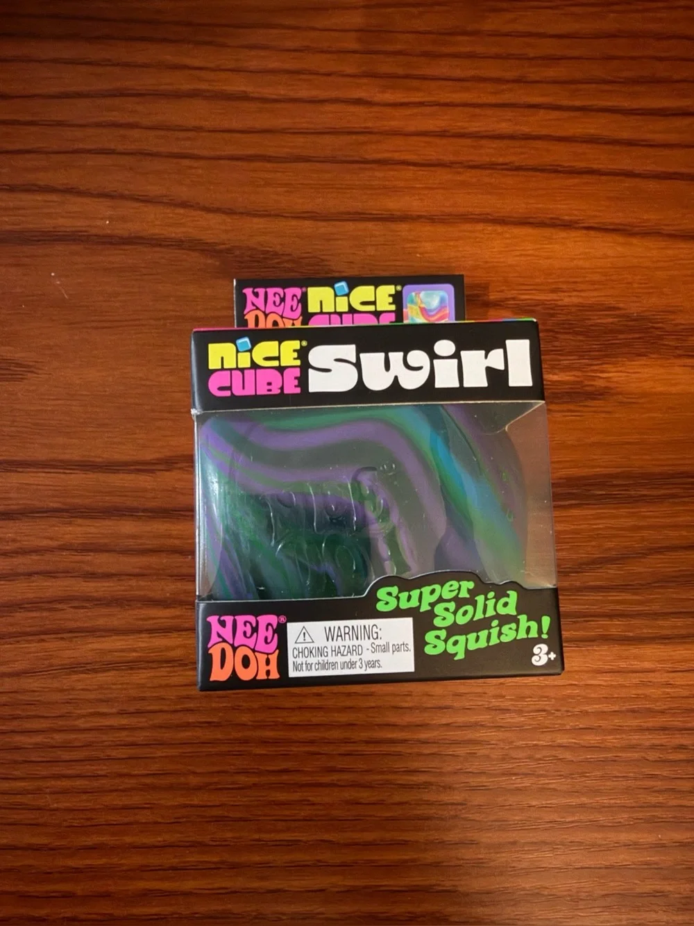 Schylling NeeDoh Nice Cube SWIRL! Brand new, unopened - Green/Purple